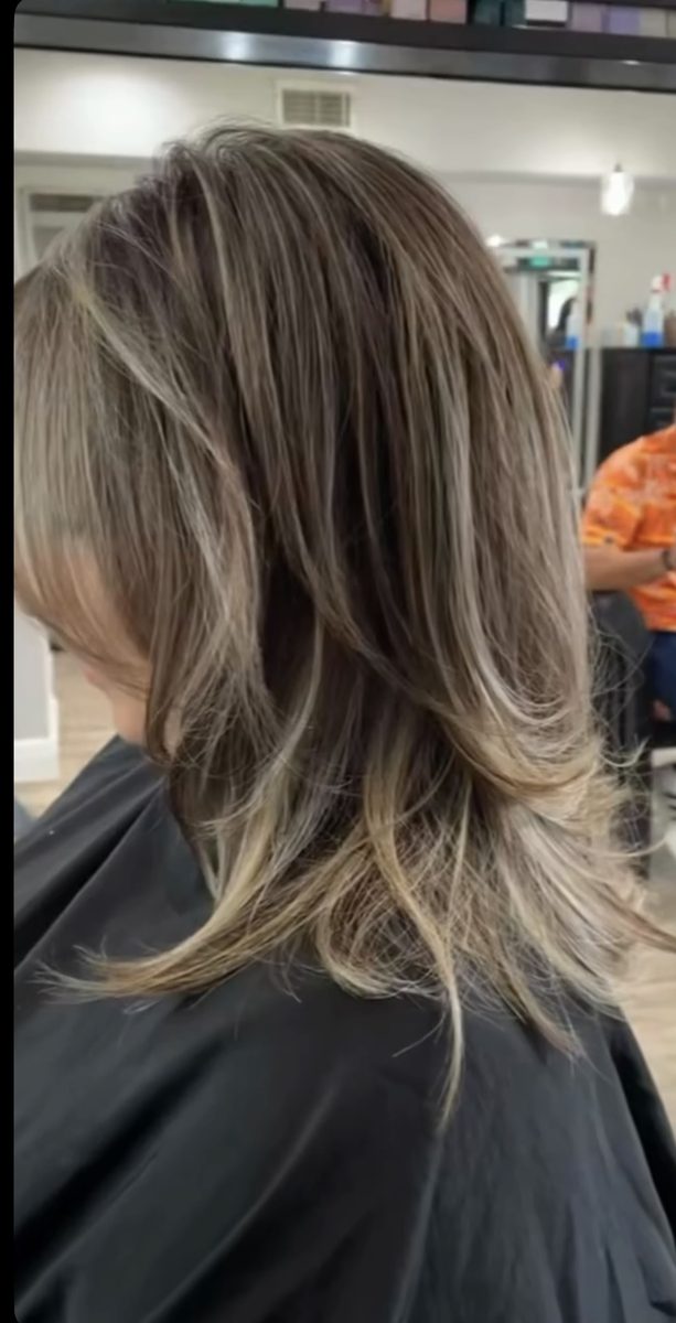 Ash blonde balayage with layered cut