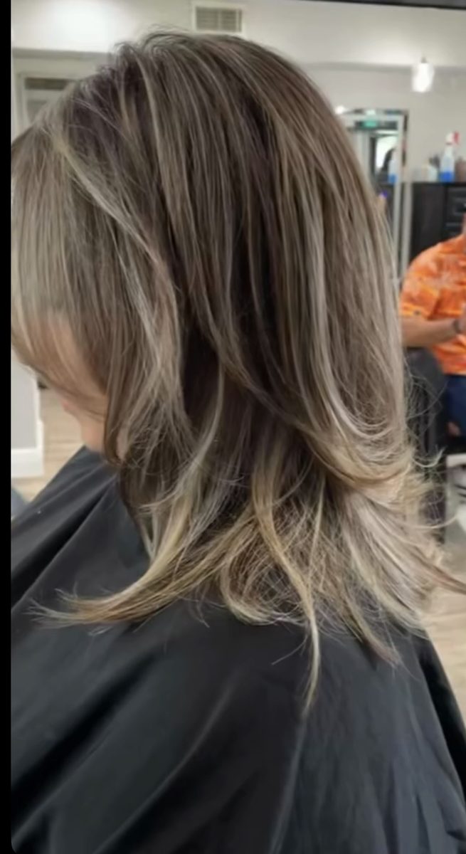 Cool blonde balayage with soft layers